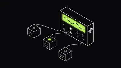 A switchboard patched into three tool units, with the middle unit's lamp glowing lime
